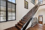 Take the stairs up to the master bedroom